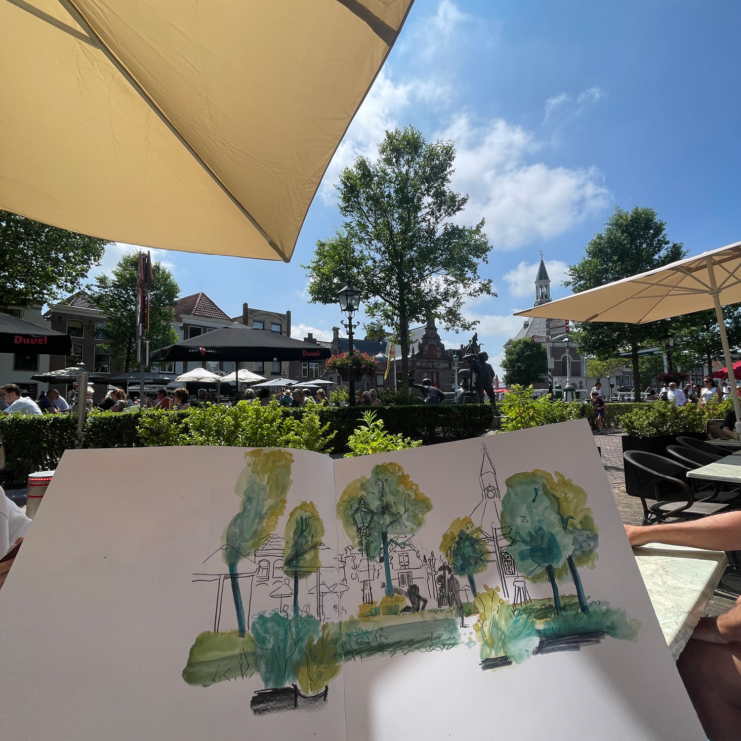 Illustration from a terrace overlooking the Sluis and Pepermolen, with the actual view in the background.